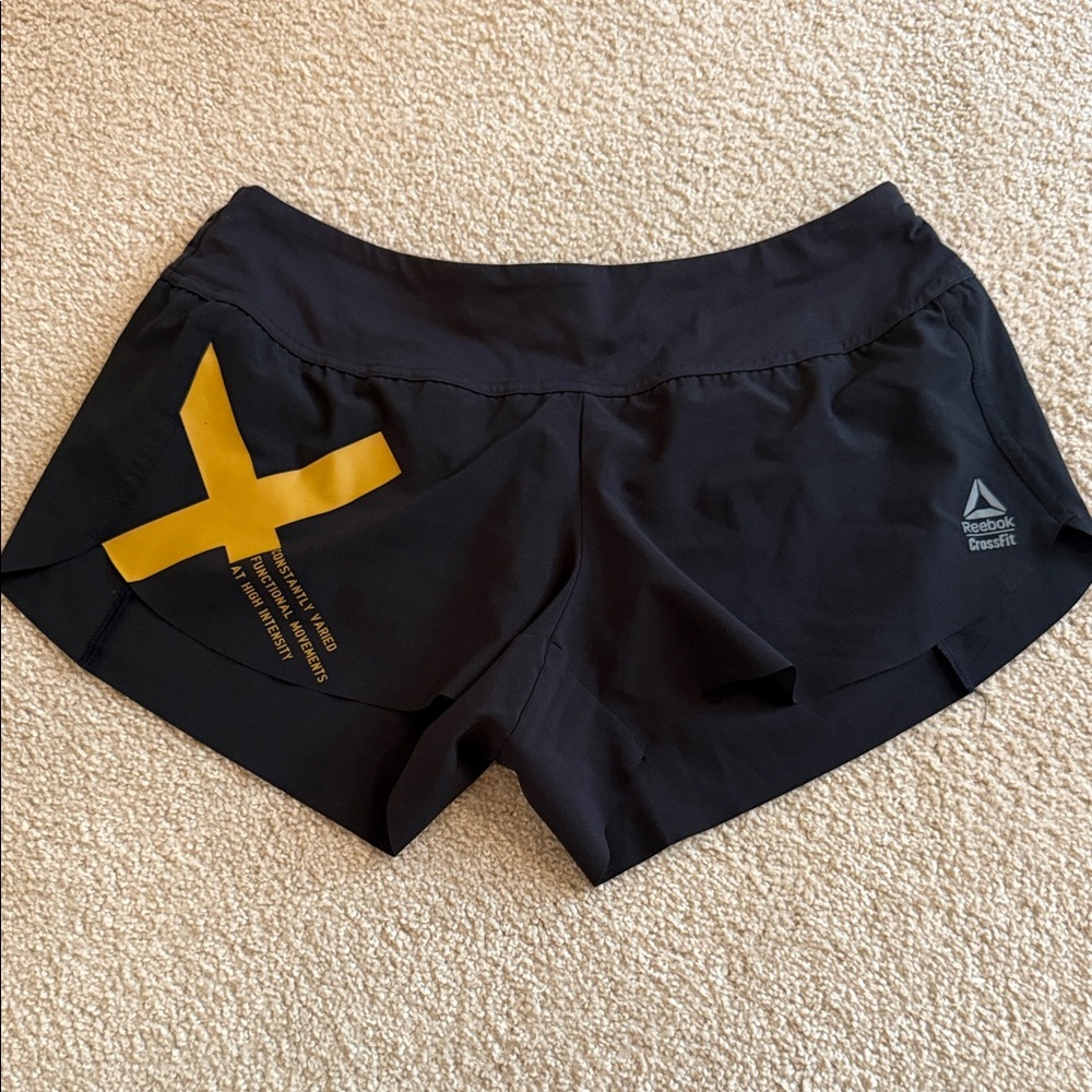 Reebok Women's Athletic Shorts in Black with Yellow X